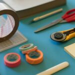 assorted-color office items on table